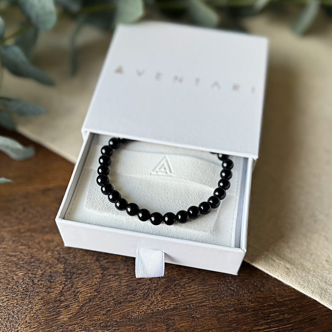 Polished Black Onyx Focus Bracelet by Aventari presented in its white branded gift box for strength and purpose.